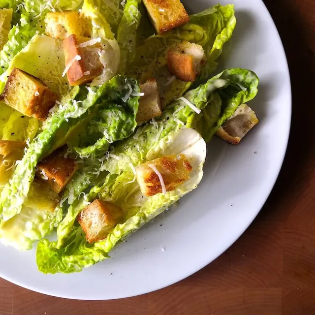 Photo of Excellent Caesar salad with croutons