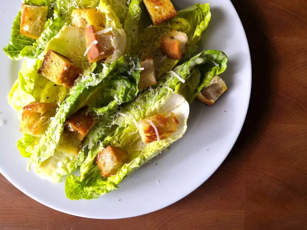 Photo of Excellent Caesar salad with croutons