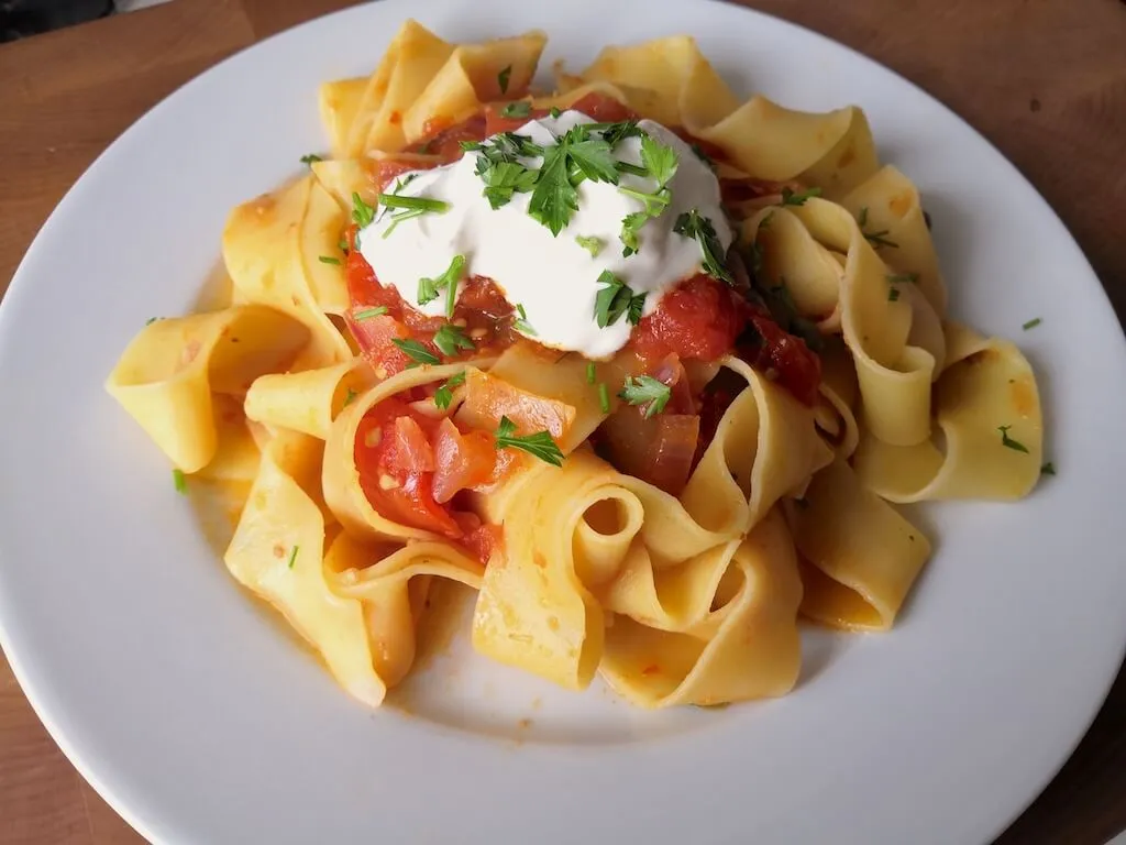 Photo of Papardelle with harissa, olives and capers