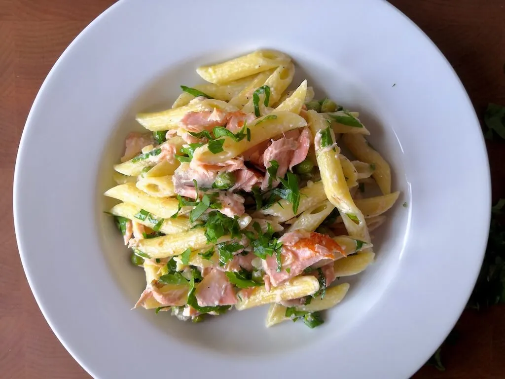 Photo of Pasta with salmon, frozen peas and wine-based sauce