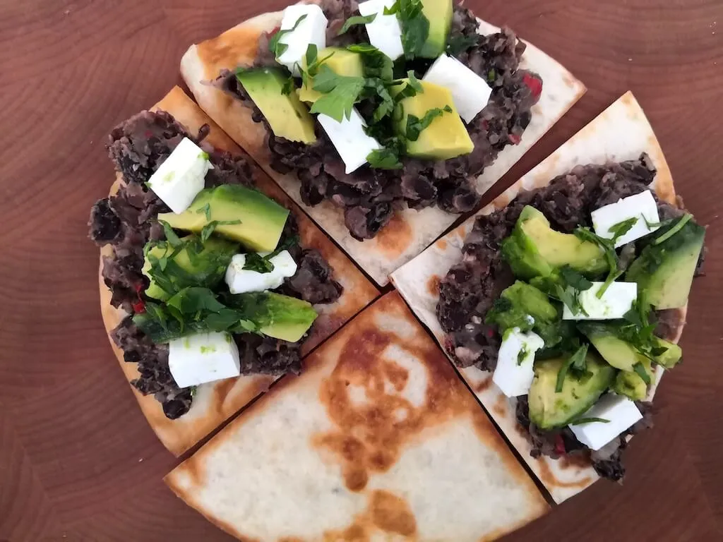 Photo of Spicy black beans with feta and avocado
