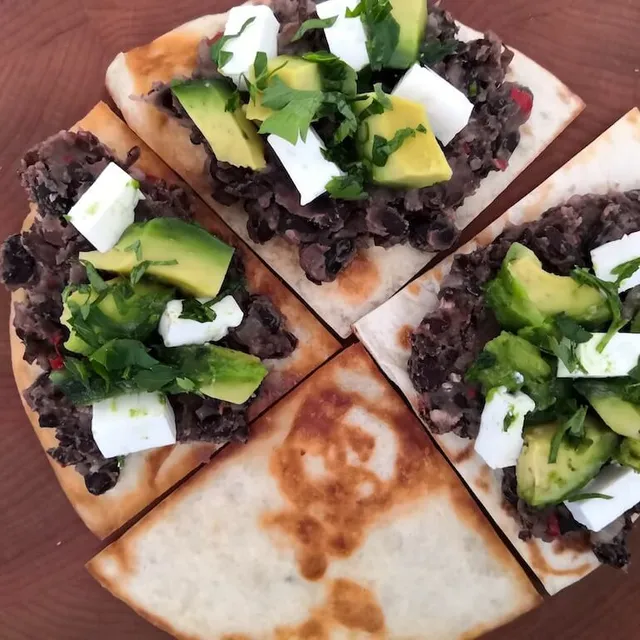 Photo of Spicy black beans with feta and avocado